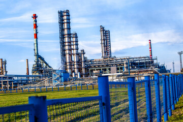 Refinery pipes and buildings - big oil factory