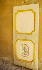 Wall with decorative door located in Recanati., Marche - Italy