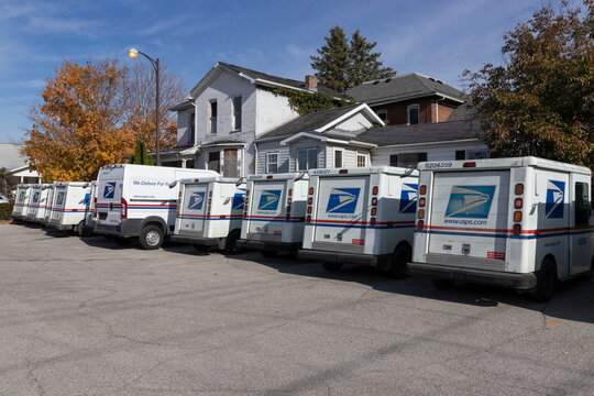 USPS Post Office Mail Trucks. The Post Office Is Responsible For Providing Mail Delivery.