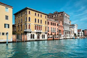 Fototapeta na wymiar Architecture of Venice, Italy. Palazzos and historic houses in the water of Grand Canal. Traditional Venetian architecture.