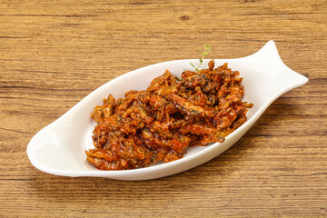 Canned anchovy in tomato sauce