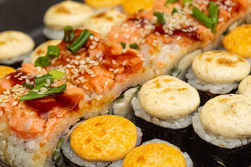 Japanese dish of sushi or rolls close-up.