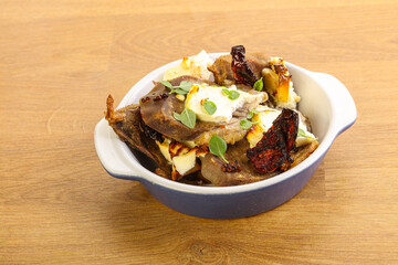 Baked pork tongue with cheese