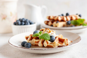 Сroffle, trendy crispy korean baked goods, top view on white background, selective focus