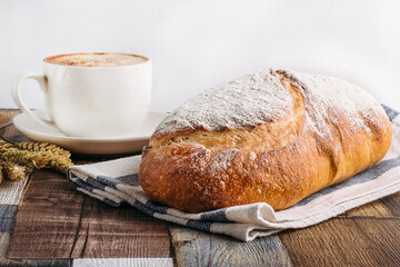 fresh bread on wooden background 