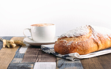 fresh bread on wooden background 