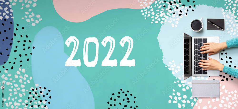 Aufkleber 2022 new year concept with person using a laptop computer