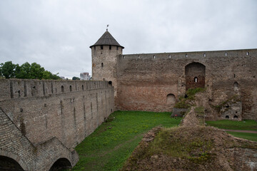 Fototapeta na wymiar Gate tower of Ivangorod Fortress. The fortress was built in 1492. Ivangorod, Russia