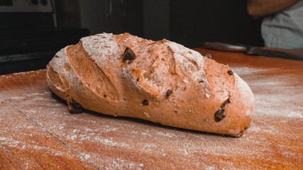 Person preparing bread.