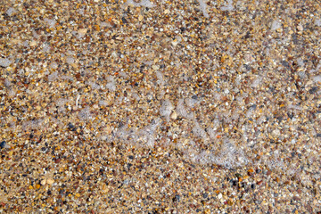 Waves on the shore of the beach
