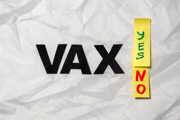 Word VAX and stickers Yes, No on white crumpled background, top view. Concept of choosing for or against vaccination