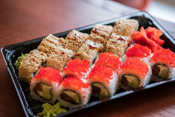 A set of sushi with different fillings and names