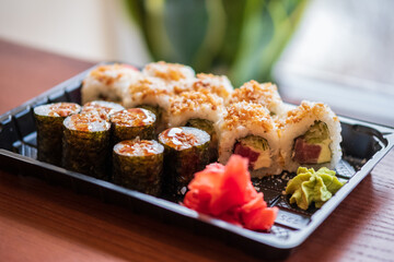 A set of sushi with different fillings and names