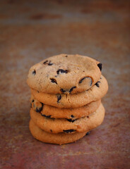 Chocolate cookies on a old table. Chocolate chip cookies shot