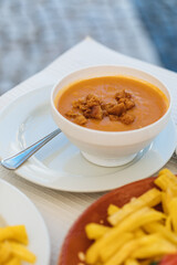 Shellfish soup served in bowl ready to eat