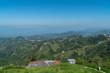 Fototapeta na wymiar Rural landscape with beautiful blue sky in Manizales, Caldas, Colombia.