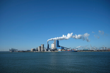 ROTTERDAM, THE NETHERLANDS The Uniper coal power plant in full operation with smoking chimneys at...