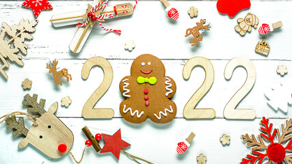 Christmas composition made of Christmas decoration and 2022 numbers on White background. Minimal concept of Xmas and New Year