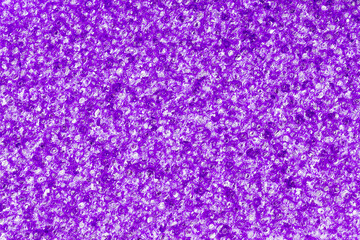 texture of purple foam sponge close-up for background