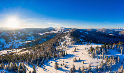 Magical winter panorama of beautiful snowy slopes