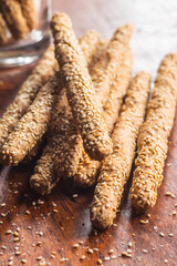 Breadsticks grissini. Bread sticks with sesame seeds.