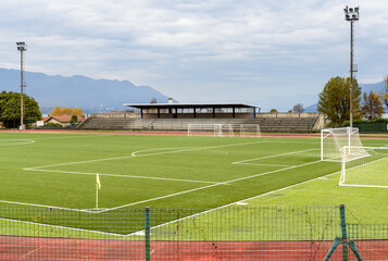 Fototapeta premium View of new football field in Maccagno Inferiore with Pino and Veddasca, province of Varese, Italy