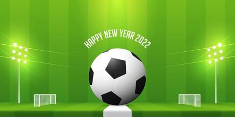 Happy New Year 2022 banner with soccer ball on soccer field background. Banner template design for New Year decoration in Soccer, Football, sport Concept. 