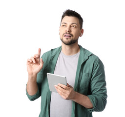 Man with tablet computer and earphones on white background