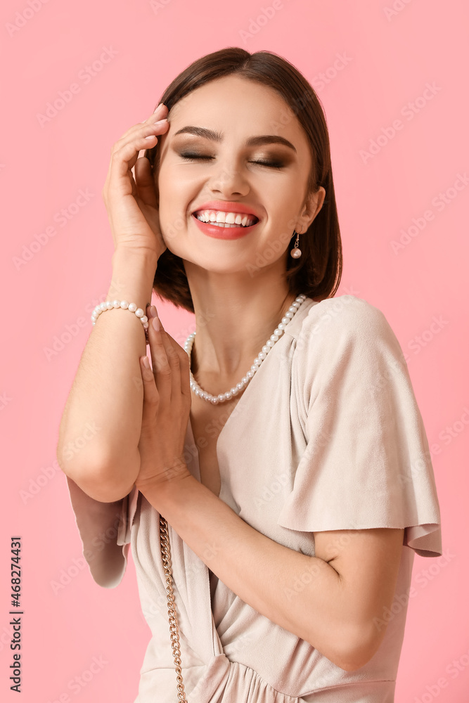 Sticker Happy woman with trendy jewelry on color background