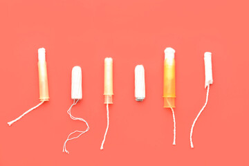 Menstrual tampons on red background