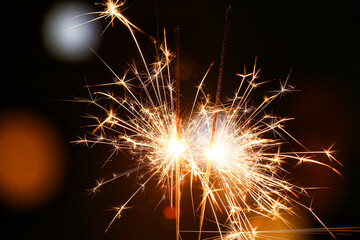 Beautiful sparklers against blurred lights