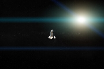 Naklejka premium Space shuttle in outer space in a front of te Sun wit lens flare. Elements of this image were furnished by NASA.