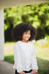 young African American child playing at home, happy childhood lifestyle concept