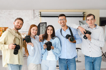 Group of photographers during classes in studio