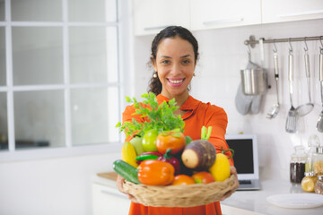 African American woman having fun and enjoy happy with a food in kitchen at home