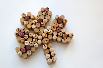 Saint Patrick's Day wine corks shamrock composition isolated on white background