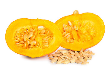 Pile of natural pumpkin seeds and cut fresh vegetables on white background
