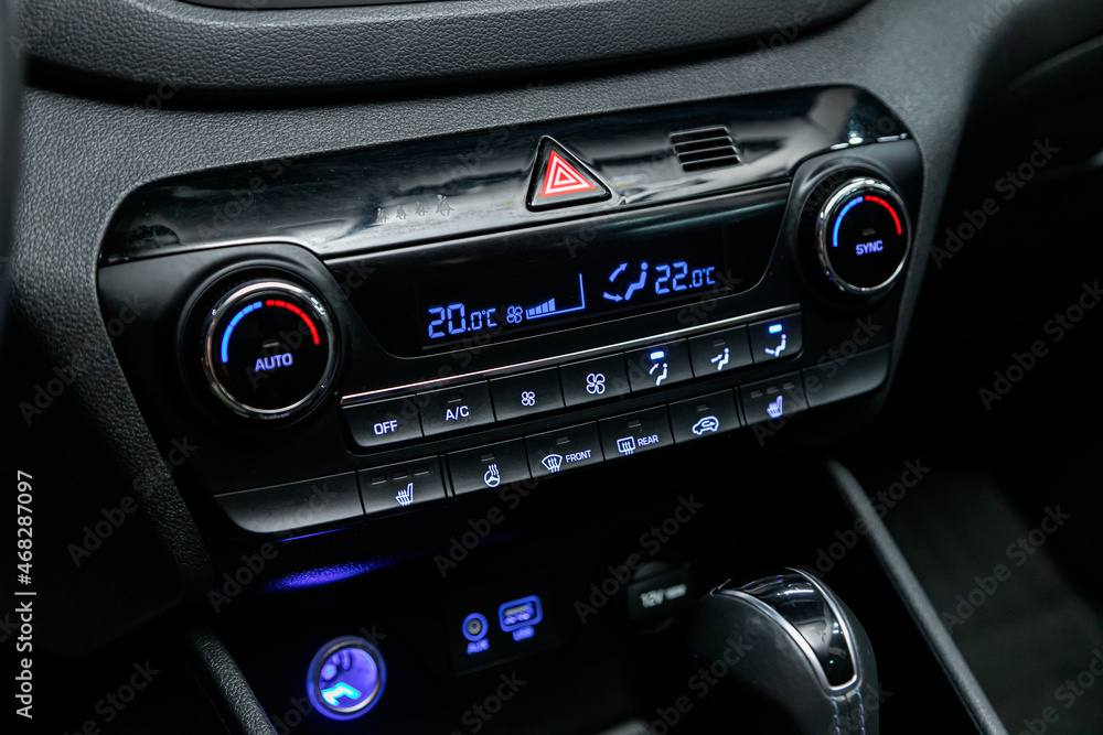 Poster close up instrument automobile panel with climat control view with air conditioning buttons- details