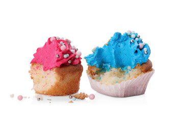 Failed cupcakes with cream on white background. Troubles happen
