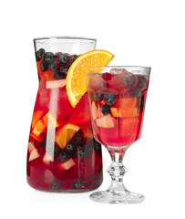 Glass and jug of Red Sangria isolated on white
