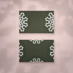 Business card in dark green color with luxurious white ornaments for your business.