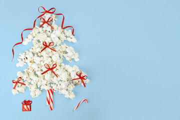 popcorn christmas tree on blue background