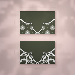 Dark green business card with white Greek ornament for your contacts.