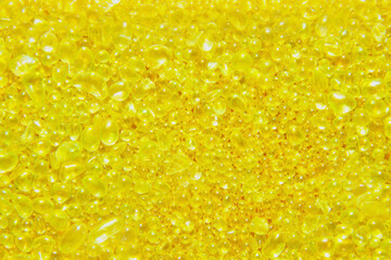 黄色のキラキラとしたガラスの雫