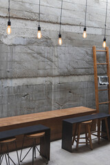 Layout in a loft style in dark colors open space interior view of various coffee Welcome open coffee shop background.
