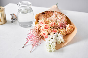 Unpacking Flowers bunch, set for home. Fresh cut flowers for decoration home. European floral shop. Delivery fresh cut flower.