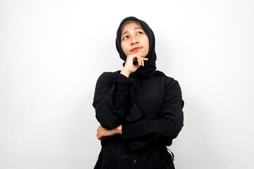 Beautiful asian young muslim woman thinking, looking for ideas, looking for solutions to problems, with hands holding chin, isolated on white background