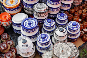 Colorful blue pickle hand-made container shop at Hunar Haat 2021, Rampur, Uttar Pradesh, India