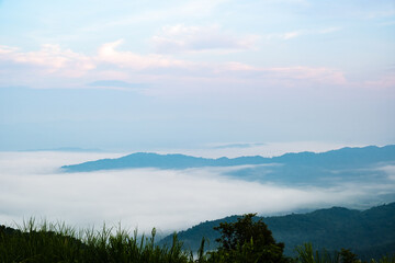 Surreal landscape of morning foggy..Morning clouds at sunrise.Landscape of fog and mountains of northern Thailand.