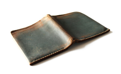 Old wallet is empty, no banknotes placed on the white background. Isolated.